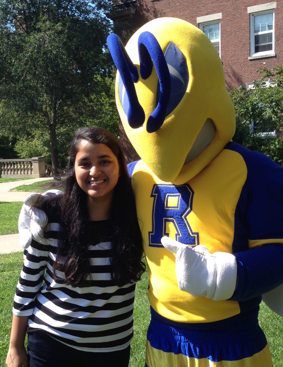 Me, posing with Rocky, the school mascot.