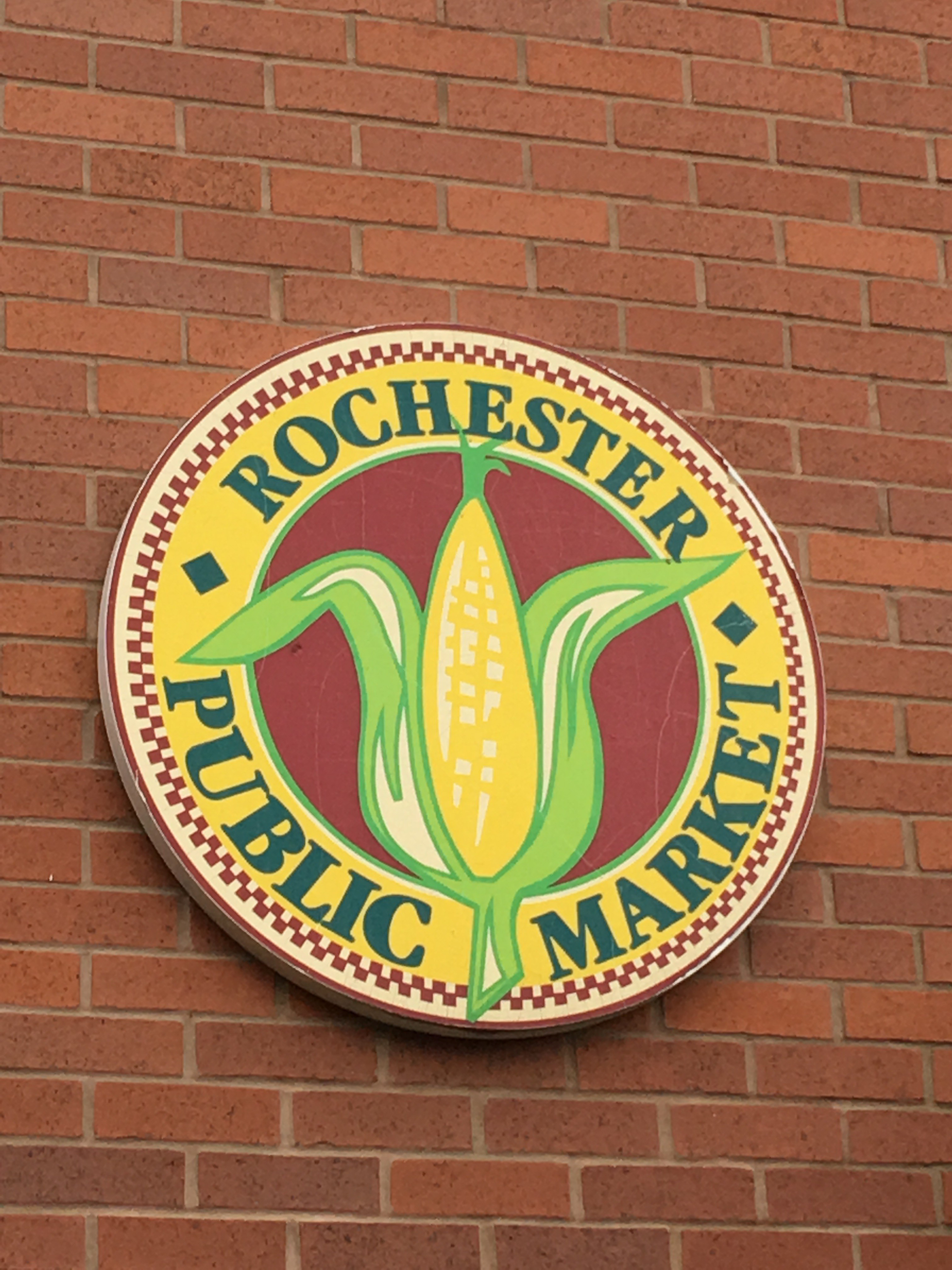 Rochester Public Market logo, an illustration of a corn cob