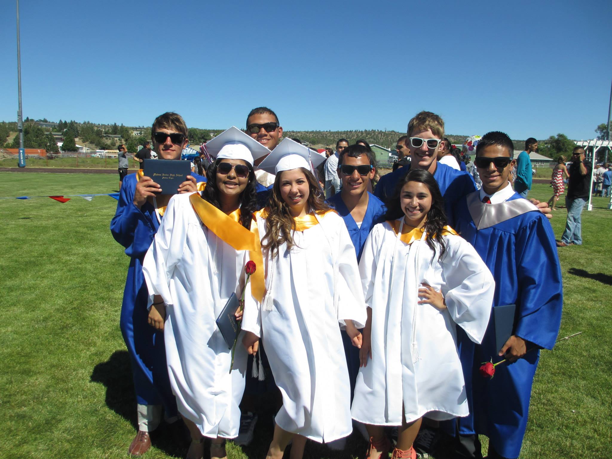 Jamie in her cap and gown with friends