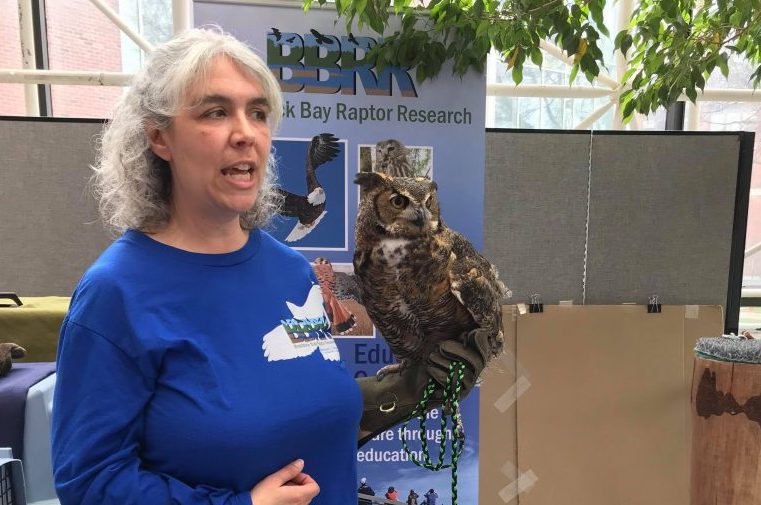 Braddock Bay Raptor Research rep with owl cropped