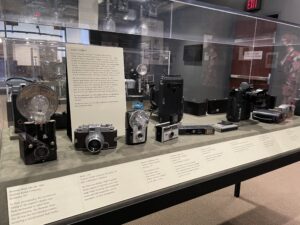 Vintage film cameras on display.